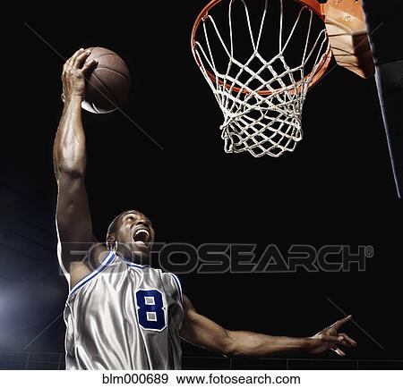 African basketball player scoring View Large Photo Image Stock Photo - African basketball player scoring. Fotosearch