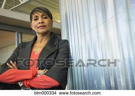 African businesswoman with arms crossed View Large Photo Image Picture - African businesswoman with arms crossed. Fotosearch