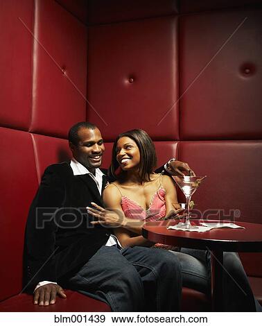 African couple drinking martinis in nightclub View Large Photo Image Stock Photo - African couple drinking martinis in nightclub. Fotosearch