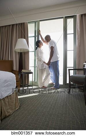 African couple in pajamas holding hands View Large Photo Image Stock Photo - African couple in pajamas holding hands. Fotosearch