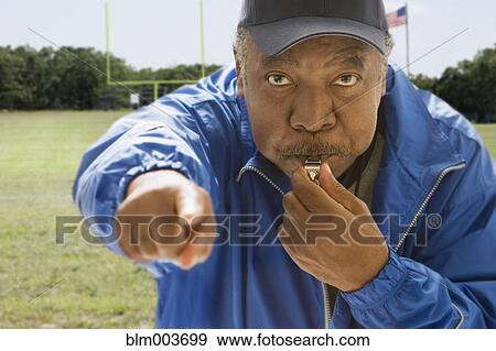 African football referee blowing whistle View Large Photo Image Stock Photo - African football referee blowing whistle. Fotosearch