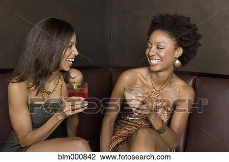 African friends hanging out in nightclub View Large Photo Image Stock Image - African friends hanging out in nightclub. Fotosearch