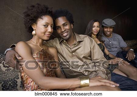 African friends hanging out in nightclub View Large Photo Image Stock Photography - African friends hanging out in nightclub. Fotosearch