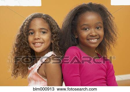Stock Image - African girls smiling. Fotosearch