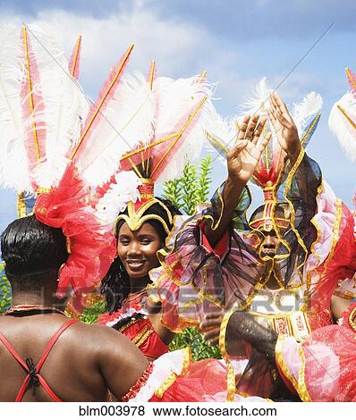 Stock Photo - African group dancing in traditional clothing. Fotosearch