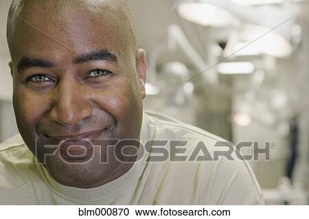 Stock Image - African man in doctorÆs office. Fotosearch