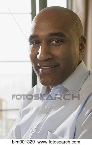 African man looking at camera View Large Photo Image Stock Photo - African man looking at camera. Fotosearch