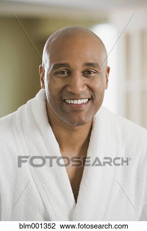 African man smiling in bathrobe View Large Photo Image Stock Image - African man smiling in bathrobe. Fotosearch