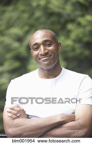 African man smiling outdoors View Large Photo Image Picture - African man smiling outdoors. Fotosearch