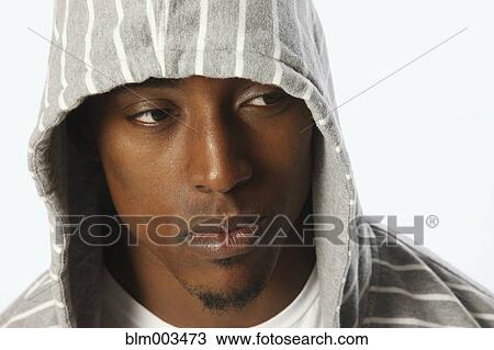 African man wearing hooded shirt View Large Photo Image Stock Image - African man wearing hooded shirt. Fotosearch