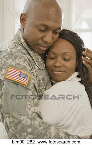 African soldier and girlfriend hugging View Large Photo Image Stock Image - African soldier and girlfriend hugging. Fotosearch