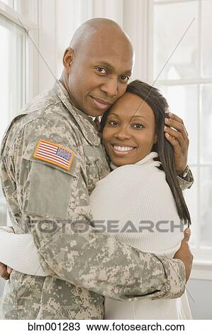 African soldier and girlfriend hugging View Large Photo Image Stock Image - African soldier and girlfriend hugging. Fotosearch