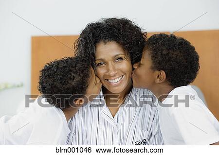 African sons kissing mother View Large Photo Image Stock Photograph - African sons kissing mother. Fotosearch