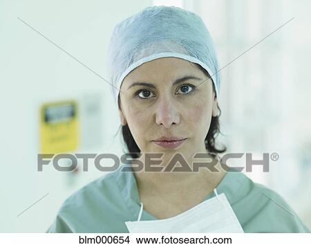 Picture - African surgeon in surgical cap and mask. Fotosearch
