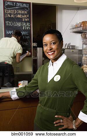 African woman business owner in cafe View Large Photo Image Stock Photo - African woman business owner in cafe. Fotosearch