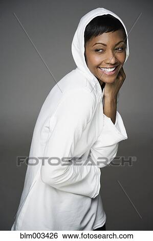 African woman in hooded shirt View Large Photo Image Stock Photograph - African woman in hooded shirt. Fotosearch