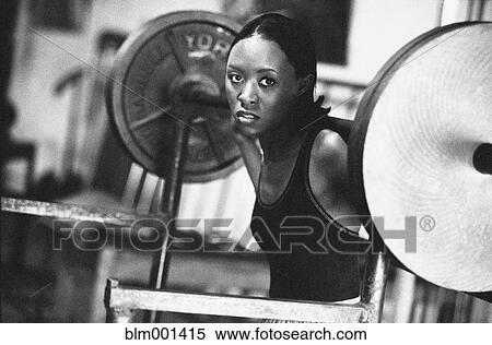 African woman weight lifting View Large Photo Image Stock Photography - African woman weight lifting. Fotosearch