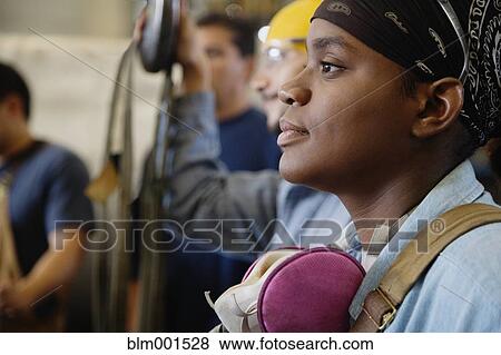 African woman with air filter mask around neck View Large Photo Image Stock Photo - African woman with air filter mask around neck. Fotosearch