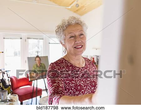 Artist painting in studio View Large Photo Image Stock Photo - Artist painting in studio. Fotosearch