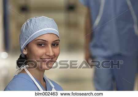 Stock Image - Asian female medical professional in hospital. Fotosearch