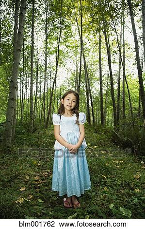 Asian girl wearing costume in woods View Large Photo Image Stock Image - Asian girl wearing costume in woods. Fotosearch