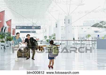 Asian grandparents greeting granddaughter in airport View Large Photo Image Stock Image - Asian grandparents greeting granddaughter in airport. Fotosearch