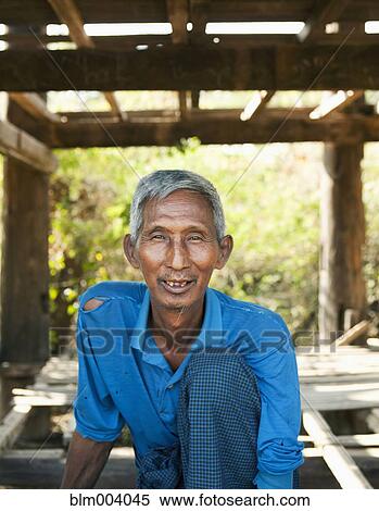 Stock Photography - Asian man smiling. Fotosearch