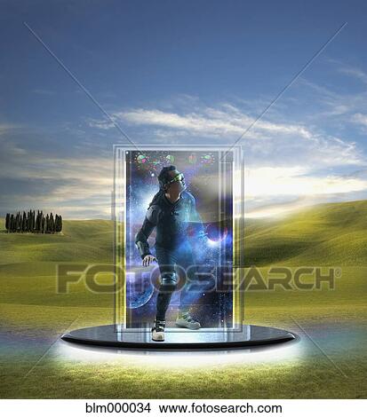 Picture - Asian man stepping through portal. Fotosearch