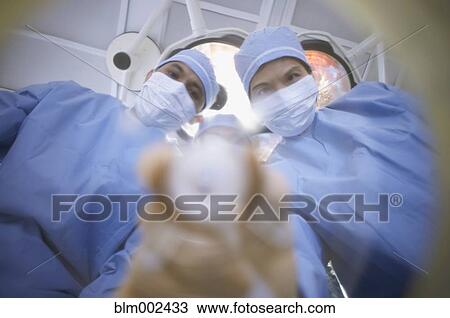 Asian medical professionals holding oxygen mask View Large Photo Image Stock Image - Asian medical professionals holding oxygen mask. Fotosearch