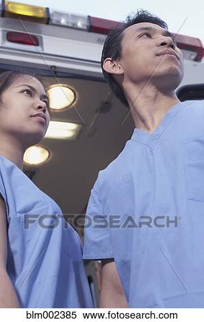 Asian medical professionals standing at back of ambulance View Large Photo Image Stock Photography - Asian medical professionals standing at back of ambulance. Fotosearch