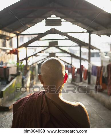 Stock Photo - Asian monk on street. Fotosearch