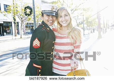 Asian soldier and friend smiling outdoors View Large Photo Image Stock Photograph - Asian soldier and friend smiling outdoors. Fotosearch