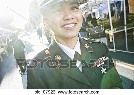 Asian soldier smiling in farmers market View Large Photo Image Stock Image - Asian soldier smiling in farmers market. Fotosearch