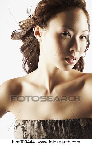 Asian woman in evening gown View Large Photo Image Picture - Asian woman in evening gown. Fotosearch