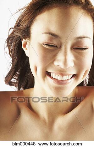 Asian woman laughing View Large Photo Image Stock Photo - Asian woman laughing. Fotosearch