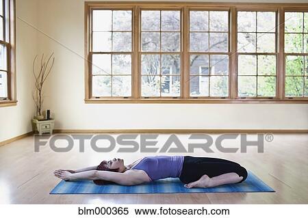 Asian woman practicing yoga View Large Photo Image Stock Photography - Asian woman practicing yoga. Fotosearch