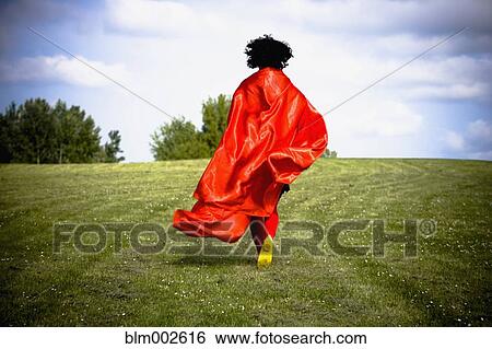 Asian woman running in field View Large Photo Image Stock Photograph - Asian woman running in field. Fotosearch
