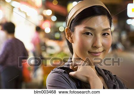 Stock Photo - Asian woman smiling. Fotosearch