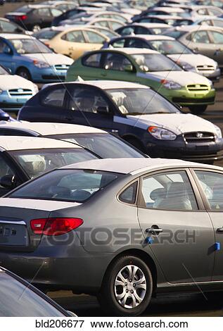 Stock Photo - Automobiles in a Parking Lot. Fotosearch