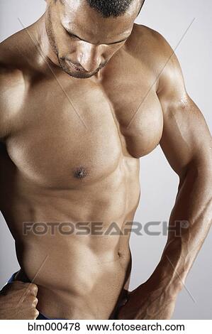 Bare chested mixed race man View Large Photo Image Stock Photo - Bare chested mixed race man. Fotosearch