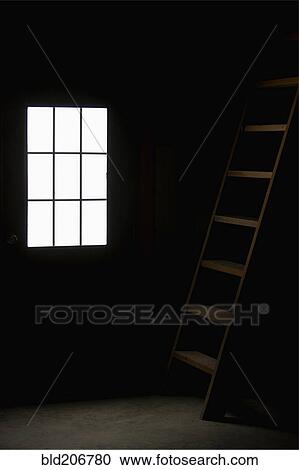 Stock Image - Barn Doorway and Loft Ladder. Fotosearch