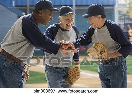 Baseball players in huddle View Large Photo Image Stock Photo - Baseball players in huddle. Fotosearch