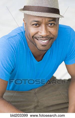 Stock Photo - Black man smiling. Fotosearch