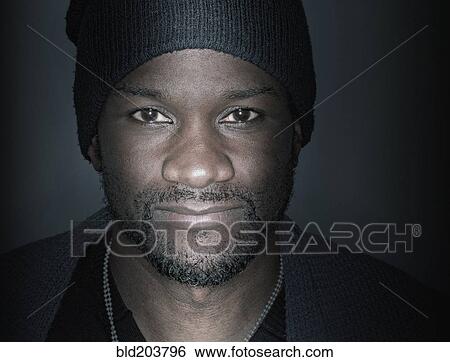 Stock Photograph - Black man smiling. Fotosearch