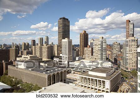 Stock Image - Blue sky and cityscape, New York, New York, United States. Fotosearch