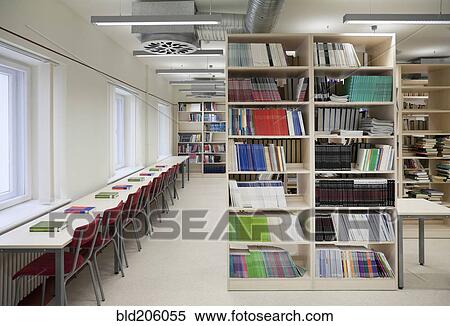 Books on shelves in library View Large Photo Image Stock Photography - Books on shelves in library. Fotosearch
