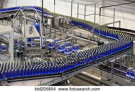 Picture - Bottles on production line in bottling plant. Fotosearch