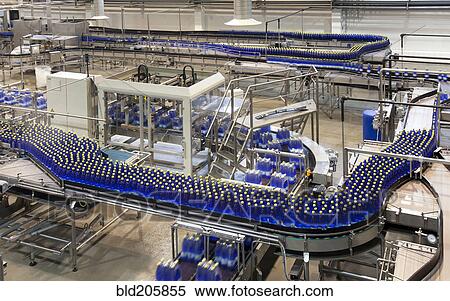 Stock Photography - Bottles on production line in bottling plant. Fotosearch