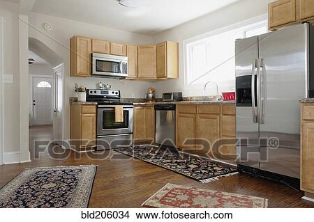 Picture - Boxes and cartons stacked in a house. Fotosearch
