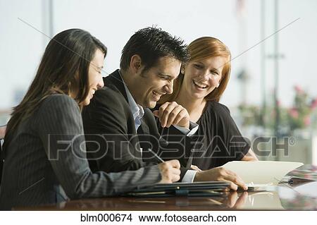 Picture - Business people in conference room for meeting. Fotosearch